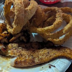 Repka's - Grilled catfish and shrimp along with onion rings. The food was flavored and tasty.