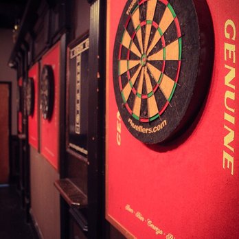 Atmosphere - darts on a red wall in a bar - New American Near Me - Loganville, Georgia Atmosphere - darts on a red wall in a bar - New American Near Me - Loganville, Georgia