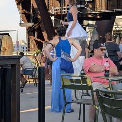 Rock Island Bridge - Performers walking around.