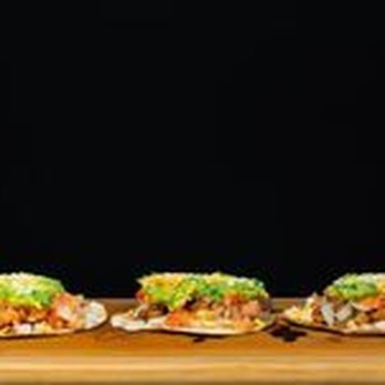 Piaja's Food - three tacos on a cutting board - Food Trucks Near Me - Miami, Florida Piaja's Food - three tacos on a cutting board - Food Trucks Near Me - Miami, Florida