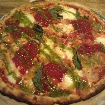 Blaze Pizza - Mozzarella, ovaline mozzarella, cherry tomatoes, sautéed onions, basil, pesto drizzle, and dollops of red sauce....drool! - Pizza Near Me - Carlsbad, California Blaze Pizza - Mozzarella, ovaline mozzarella, cherry tomatoes, sautéed onions, basil, pesto drizzle, and dollops of red sauce....drool! - Pizza Near Me - Carlsbad, California