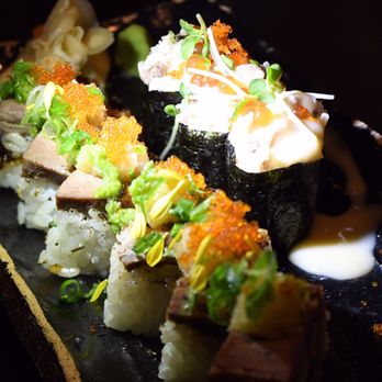 Kingyo - Duck sushi (left) and cod sushi (right) - Japanese Near Me - Vancouver, British Columbia Kingyo - Duck sushi (left) and cod sushi (right) - Japanese Near Me - Vancouver, British Columbia