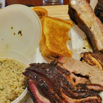 Hiram Clarke BBQ - 3 meat plate (chicken, ribs, and brisket) with Collard Greens and dirty rice, and buttery Texas Toast - Barbeque Near Me - Houston, Texas