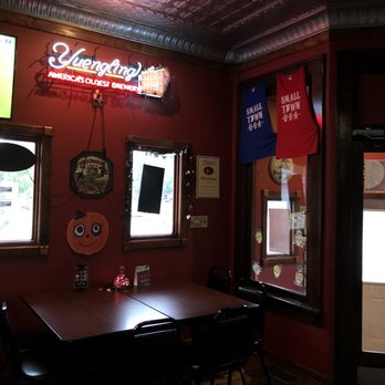 Tollys Bar and Grill - a table and chairs - Bars Near Me - Terre Haute, Indiana Tollys Bar and Grill - a table and chairs - Bars Near Me - Terre Haute, Indiana