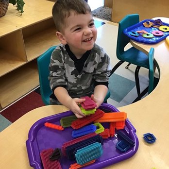 Sammamish Children's School - Playing with stackable blocks - Preschools Near Me - Sammamish, Washington Sammamish Children's School - Playing with stackable blocks - Preschools Near Me - Sammamish, Washington