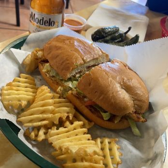 La Torta Loca - a plate with a sandwich and french fries - Mexican Near Me - Tulsa, Oklahoma La Torta Loca - a plate with a sandwich and french fries - Mexican Near Me - Tulsa, Oklahoma