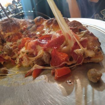 Romas Pizzeria & Restaurant - Fantastic Butter Sauce loaded Pizza OMG - Pizza Near Me - Southgate, Michigan Romas Pizzeria & Restaurant - Fantastic Butter Sauce loaded Pizza OMG - Pizza Near Me - Southgate, Michigan