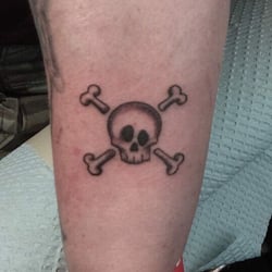Artful Impressions Tattoo and Art Gallery - Hailey did this awesome little skull for me too!