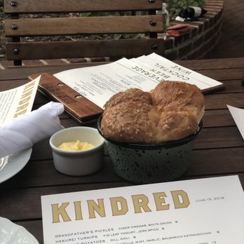 Kindred Restaurant - Bread and nice table outdoors - New American Near Me - Davidson, North Carolina Kindred Restaurant - Bread and nice table outdoors - New American Near Me - Davidson, North Carolina