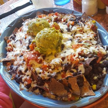 Oscar's Cafe - The nacho appetizer. Could have used more flavor or lettuce, tomato, sour cream, etc. Pretty "middle of the road" nachos. - Mexican Near Me - Springdale, Utah Oscar's Cafe - The nacho appetizer. Could have used more flavor or lettuce, tomato, sour cream, etc. Pretty "middle of the road" nachos. - Mexican Near Me - Springdale, Utah