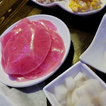Angry Chicken - Side dish and pink thing is thin sliced pickled radish, ask and you shall receive. It makes it much juicier experience - Chicken Wings Near Me - Aurora, Colorado