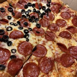 Breadeaux Pizza - Pepperoni and half black olives Hand tossed.