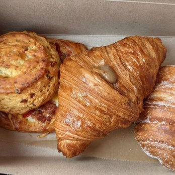 Petit Pierre Bakery - My to-box! L to R gruyere dill scone, Earl grey croissant, raspberry marscapone cruffin - Bakeries Near Me - Seattle, Washington Petit Pierre Bakery - My to-box! L to R gruyere dill scone, Earl grey croissant, raspberry marscapone cruffin - Bakeries Near Me - Seattle, Washington