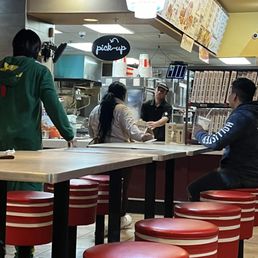 This employee threw the original bag of food. This employee threw the original bag of food.