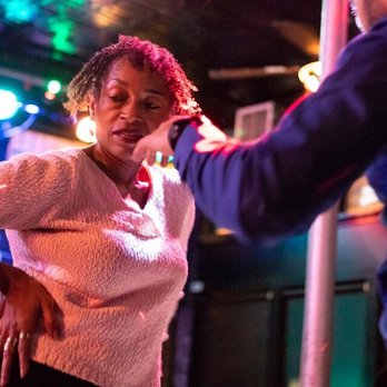 Flat Iron Cafe - a man and a woman dancing - Bars Near Me - Rochester, New York Flat Iron Cafe - a man and a woman dancing - Bars Near Me - Rochester, New York