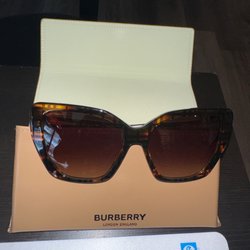 20/20 Eye Care - PRADA Sunglasses (50% off)