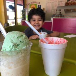 very clean and delicious Obispo drink, hot Cheeto elote, and rainbow ice cream!