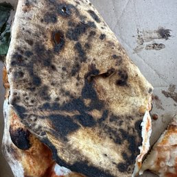 Burned Margherita pizza