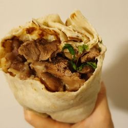 Dona Maria - Carne asada burrito (grande $10.95)