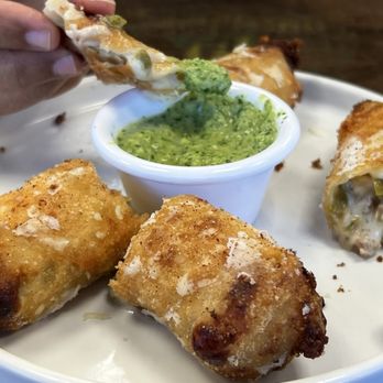 Oli's Kitchen - Philly cheesesteak egg roll... This was my favorite. Came out hot, crispy, and delicious. The pesto sauce was on point and perfect match. - Breakfast & Brunch Near Me - Honolulu, Hawaii