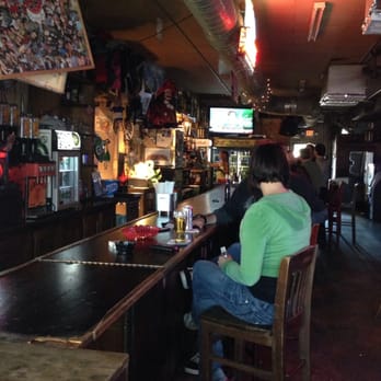 Five Paces Inn - a woman sitting at a bar - Dive Bars Near Me - Atlanta, Georgia Five Paces Inn - a woman sitting at a bar - Dive Bars Near Me - Atlanta, Georgia