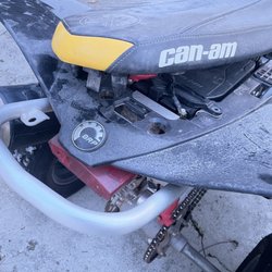 White's Cycle & Marine - Everything loose, No grips and missing coolant cap! Plus it does not even start! Battery flat and loose!