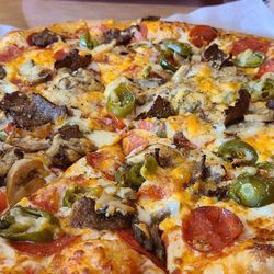 Marinos Pizza - Large with Pepperoni, Mushrooms, peppers Onion and Jalapenos