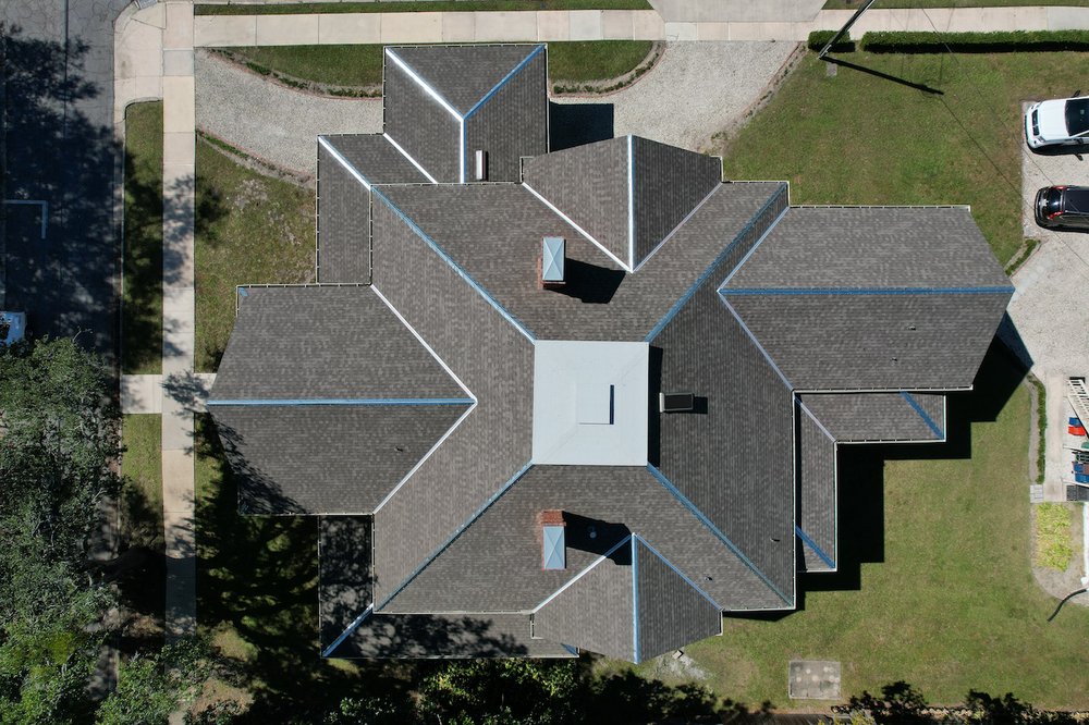 Slide of TMT Roofing