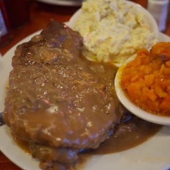 Amy Ruth's - The Honorable Keith Wright ( smothered pork chops ) potato salad & candied yams - Southern Near Me - New York, New York Amy Ruth's - The Honorable Keith Wright ( smothered pork chops ) potato salad & candied yams - Southern Near Me - New York, New York