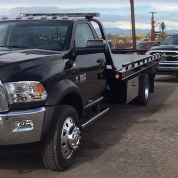 JH Mountain Auto Services - We have 2 brand new 2016 dodge 5500 series flatbeds to meet your needs and get you where you need to go safely and comfortably - Auto Repair Near Me - Silverthorne, Colorado