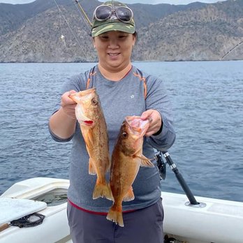 Wagner Charters - My sister with two of the many rockfish that we caught - Boat Charters Near Me - Huntington Beach, California Wagner Charters - My sister with two of the many rockfish that we caught - Boat Charters Near Me - Huntington Beach, California
