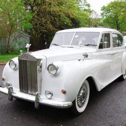 Mark of Elegance Limousine Services - Rolls Royce and stretch limo Escalade