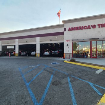 America's Tire - Front view of the showroom entrance and the three bay stations where all the magic happens. - Tires Near Me - Norwalk, California