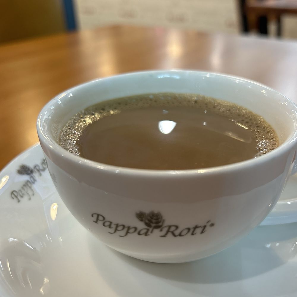Pappa Roti - Karak Chai with cardamom & saffron - Coffee & Tea Near Me - Frisco, Texas Pappa Roti - Karak Chai with cardamom & saffron - Coffee & Tea Near Me - Frisco, Texas