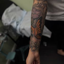 Hustle Tattoo & Piercing Studio - Revamped butterfly and flower