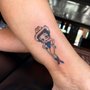 Photo of Monkey Paw Custom Tattoo