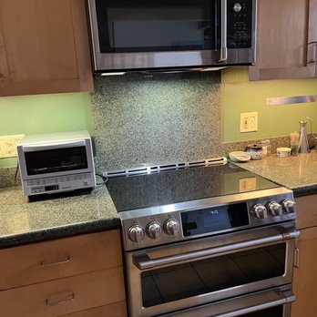 IND Construction - The granite cut for the backsplash was likely the hardest part of this job and it's perfect. Also the all-new venting in the cupboard above! - General Contractors Near Me - Encino, California IND Construction - The granite cut for the backsplash was likely the hardest part of this job and it's perfect. Also the all-new venting in the cupboard above! - General Contractors Near Me - Encino, California
