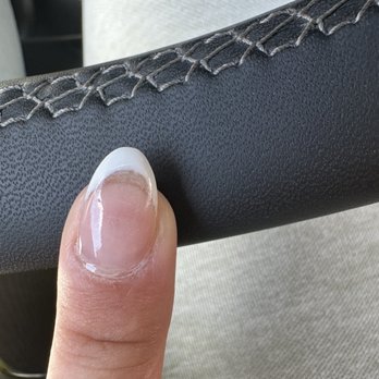 Petite Nail Spa - Uneven white gel tips and smeared white gel - Nail Salons Near Me - Santa Clara, California