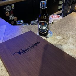 Eating at the bar rail. Eating at the bar rail.