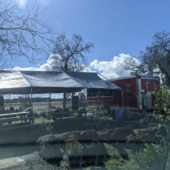 Tacos El Noa Noa - Nice set up with a canopy and outdoor tables and astroturg - Food Trucks Near Me - Sutter creek, California