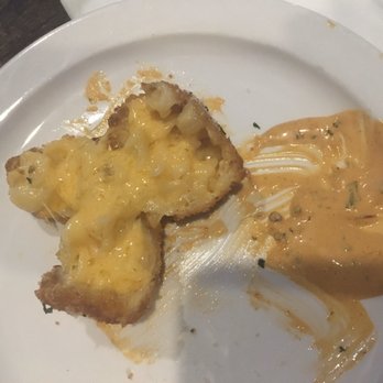 The Yard - The inside of the best mac n cheese bites I've ever had and the chipotle ranch dipping sauce. - New American Near Me - Pittsburgh, Pennsylvania