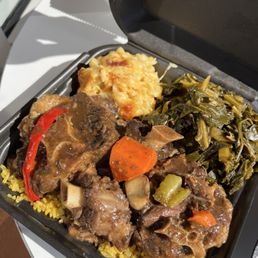Oxtails over yellow rice with Macaroni & Cheese and Smoked Turkey Collard Greens Oxtails over yellow rice with Macaroni & Cheese and Smoked Turkey Collard Greens