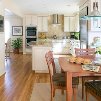 Kitchen Planners - a kitchen with a dining table and chairs - Kitchen & Bath Near Me - Bethesda, Maryland Kitchen Planners - a kitchen with a dining table and chairs - Kitchen & Bath Near Me - Bethesda, Maryland