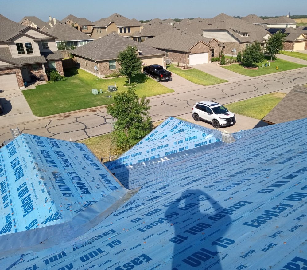 Slide of Texas Best Roofing Solutions