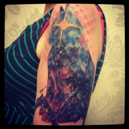 Cosmic Cattoo by Arlin Ffrench.