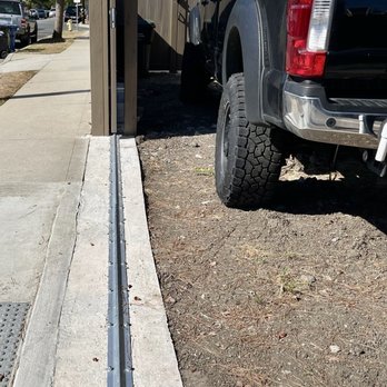 Vinyl Concepts - Track for rolling gate with a rebar-reinforced 5000 psi concrete slab. - Fences & Gates Near Me - Torrance, California Vinyl Concepts - Track for rolling gate with a rebar-reinforced 5000 psi concrete slab. - Fences & Gates Near Me - Torrance, California