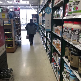 GNC - a person walking down a store aisle - Vitamins & Supplements Near Me - Philadelphia, Pennsylvania GNC - a person walking down a store aisle - Vitamins & Supplements Near Me - Philadelphia, Pennsylvania