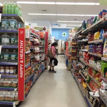 Walgreens - a woman shopping in a grocery store - Cosmetics & Beauty Supply Near Me - Flushing, New York
