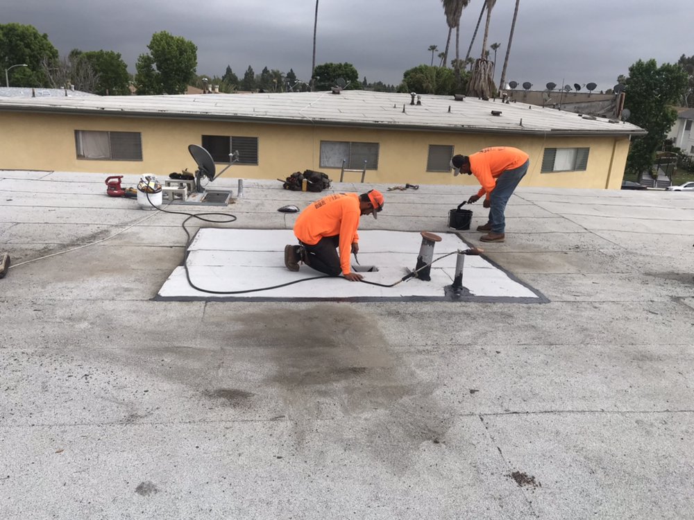 Slide of MA Roofing and Gutters