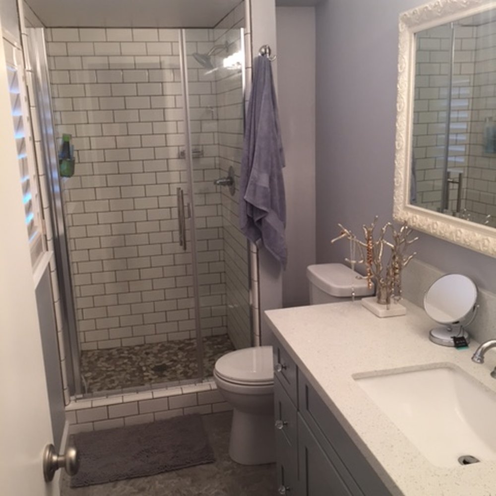 Halestone Tile - a bathroom with a walk in shower - General Contractors Near Me Halestone Tile - a bathroom with a walk in shower - General Contractors Near Me